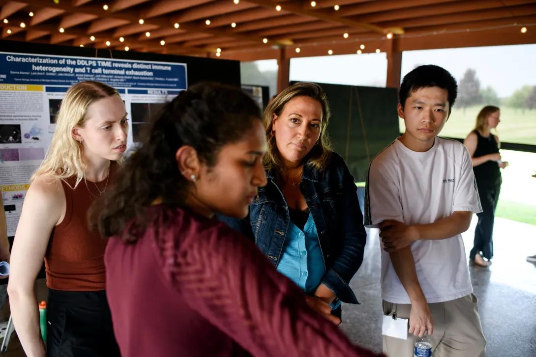 A group of people interacting outside