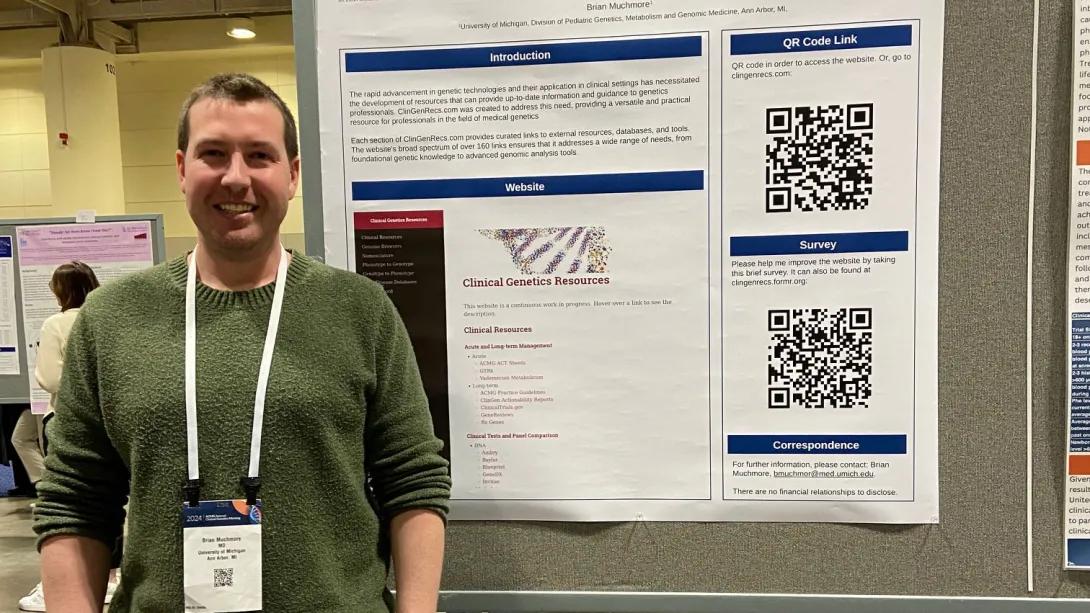 Pediatrics Medical Genetics trainee in front of research poster