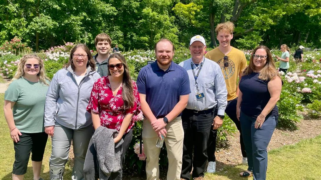 diverse group of staff members in peony gardens Ann Arbor