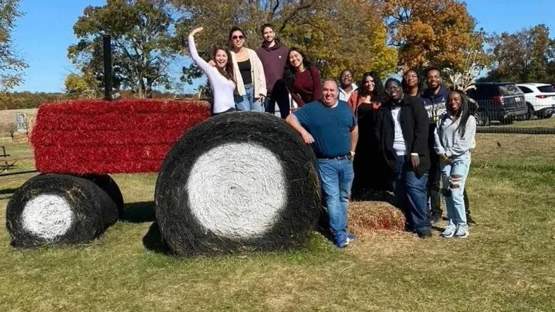 Group of students on a tractor