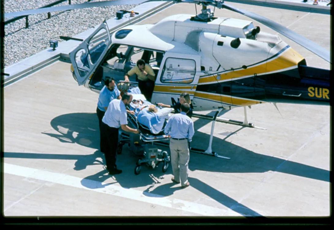 Old photo of survival flight helicopter with patient on stretcher